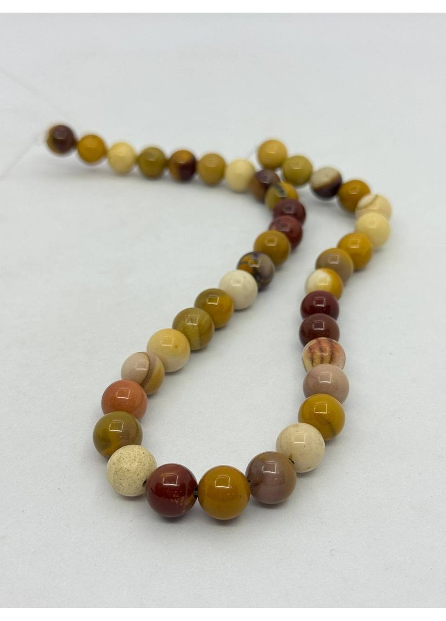 Мукаїт на нитці без застібки 10 мм 40 см Жовтий No Brand (372468012)