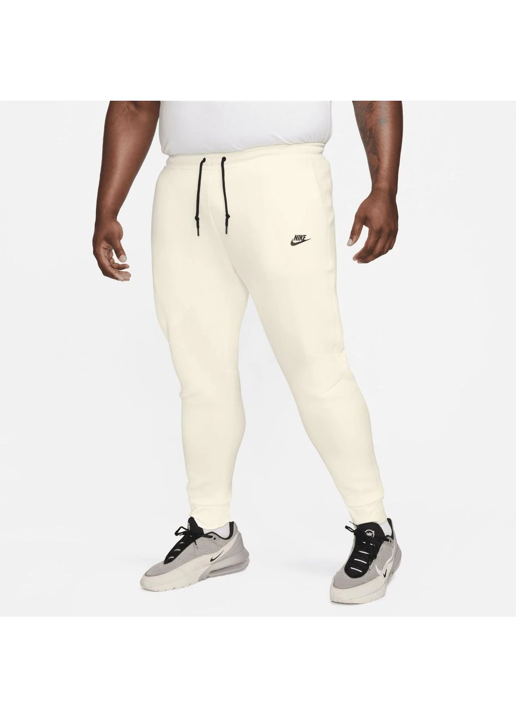 Бежевые брюки Nike