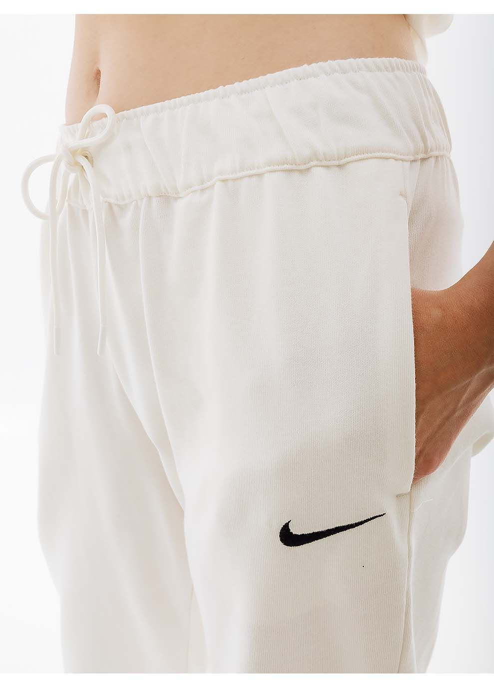 Женские Брюки W NSW JRSY EASY JOGGER Бежевый Nike (367589193)