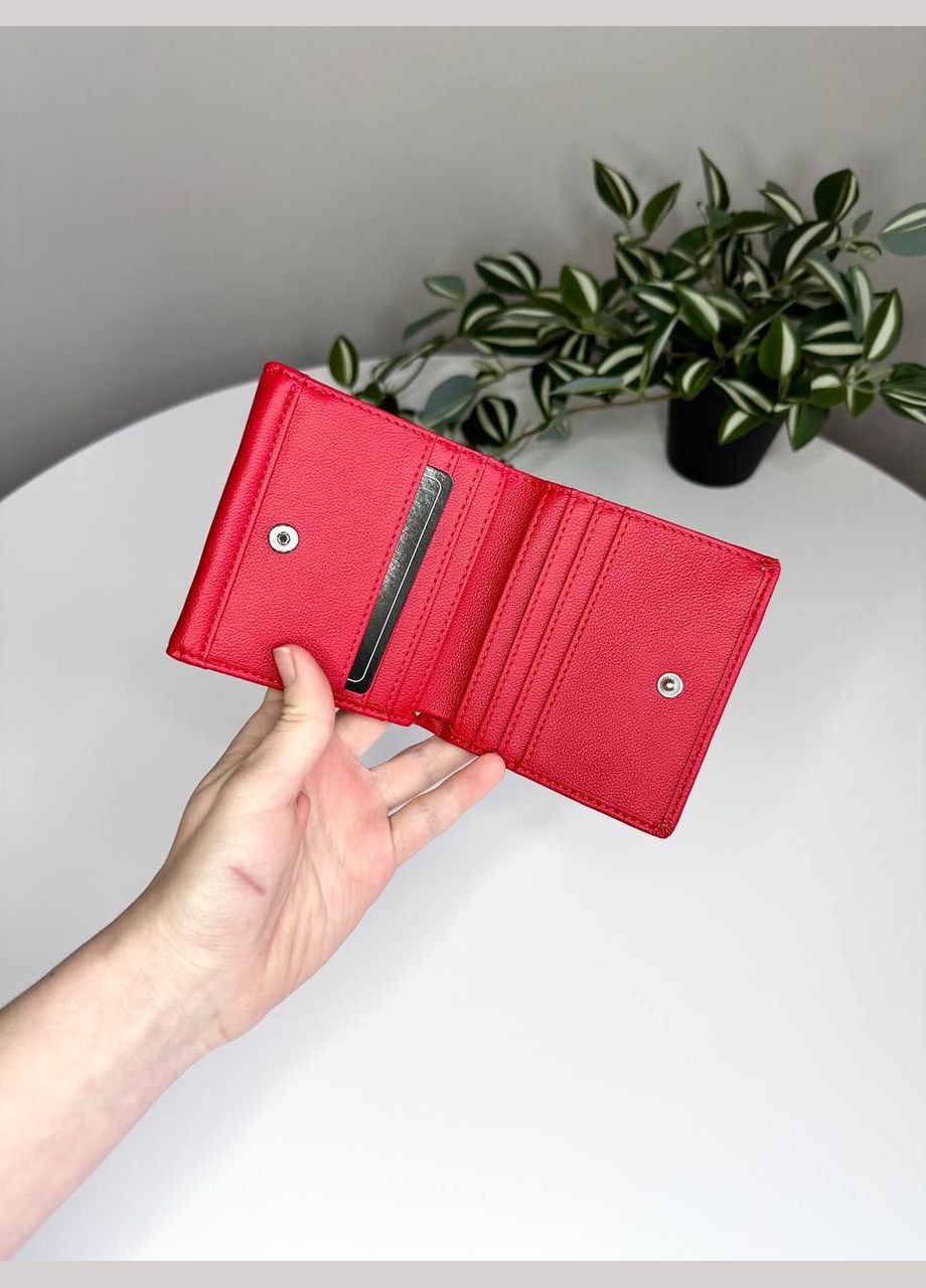 Жіночий гаманець на кнопці з євромонетницею Saralyn (294983642)