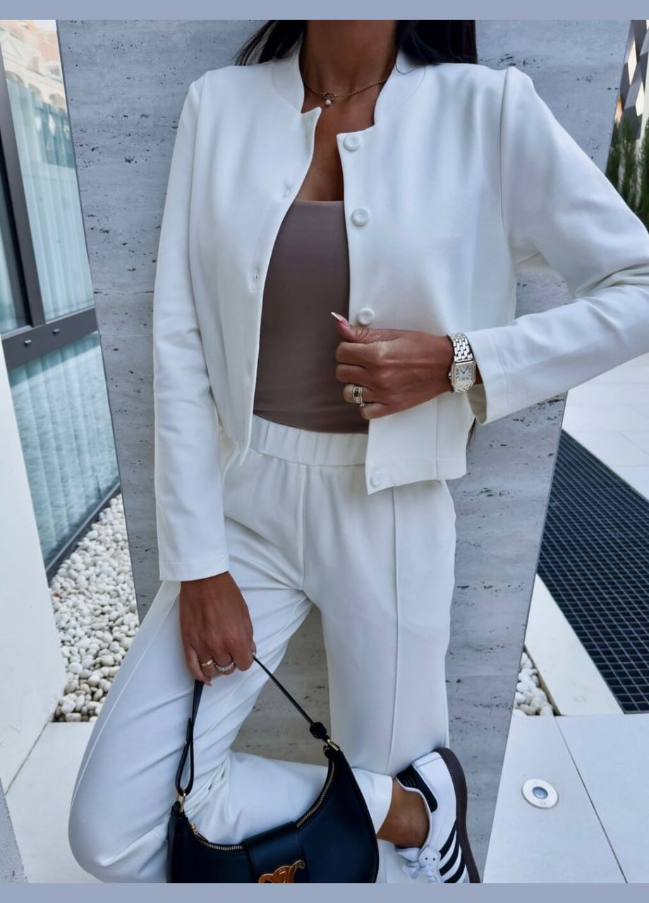 Жіночий костюм-двійка колір білий р.42/44 453236 New Trend (286772028)