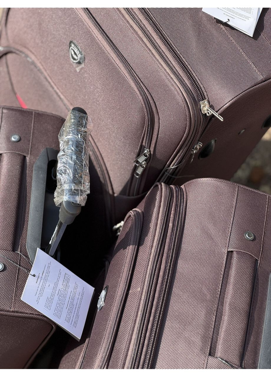 Велика Валіза дорожня тканинна L Польща на колесах з підшипником Wings (383379606)