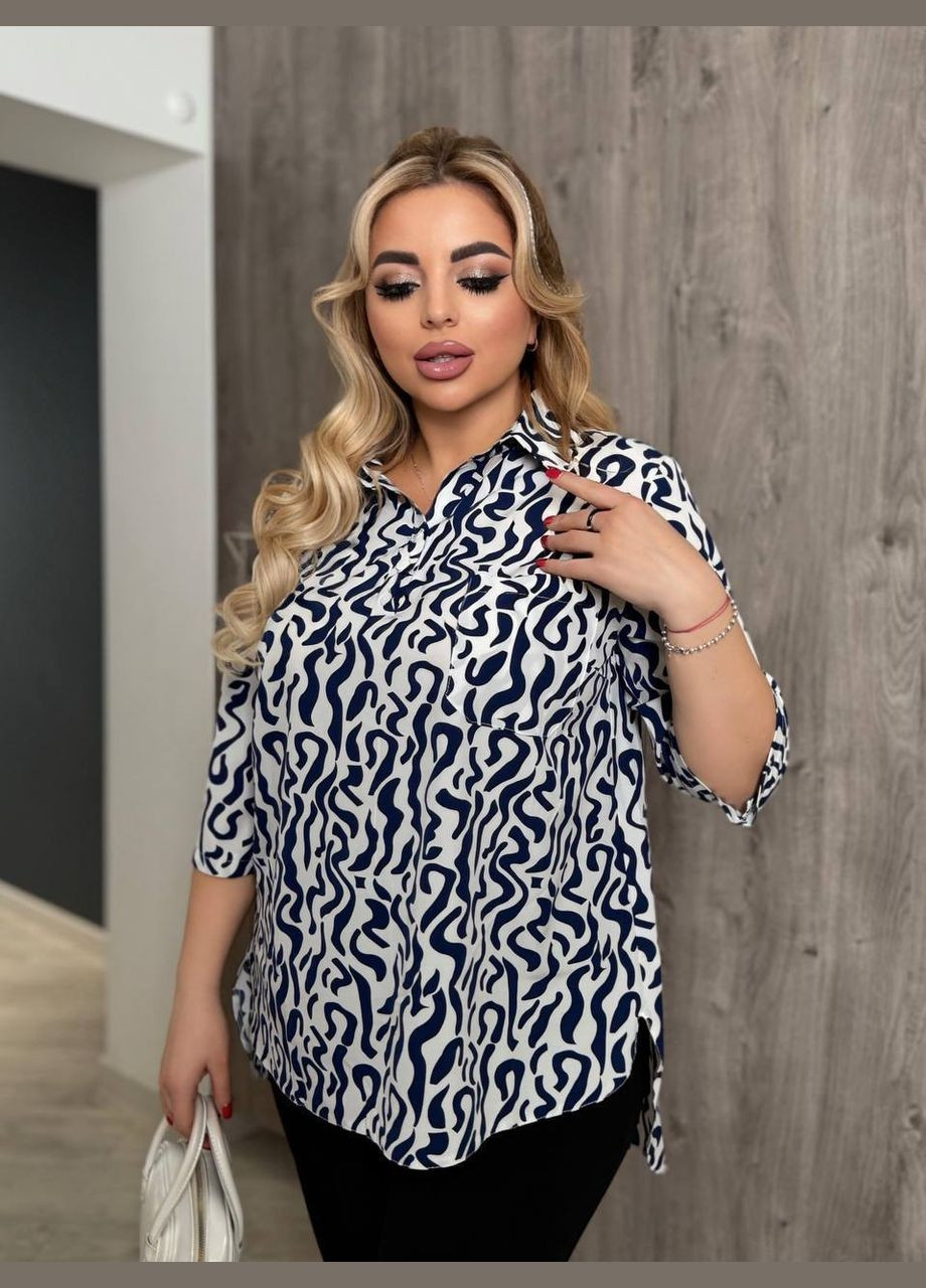 Біла жіноча блузка вільного крою з широким рукавом MonCher