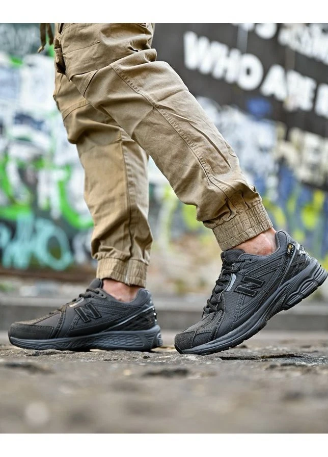 Серые демисезонные мужские демисезонные кроссовки 1906 cordura серые New Balance