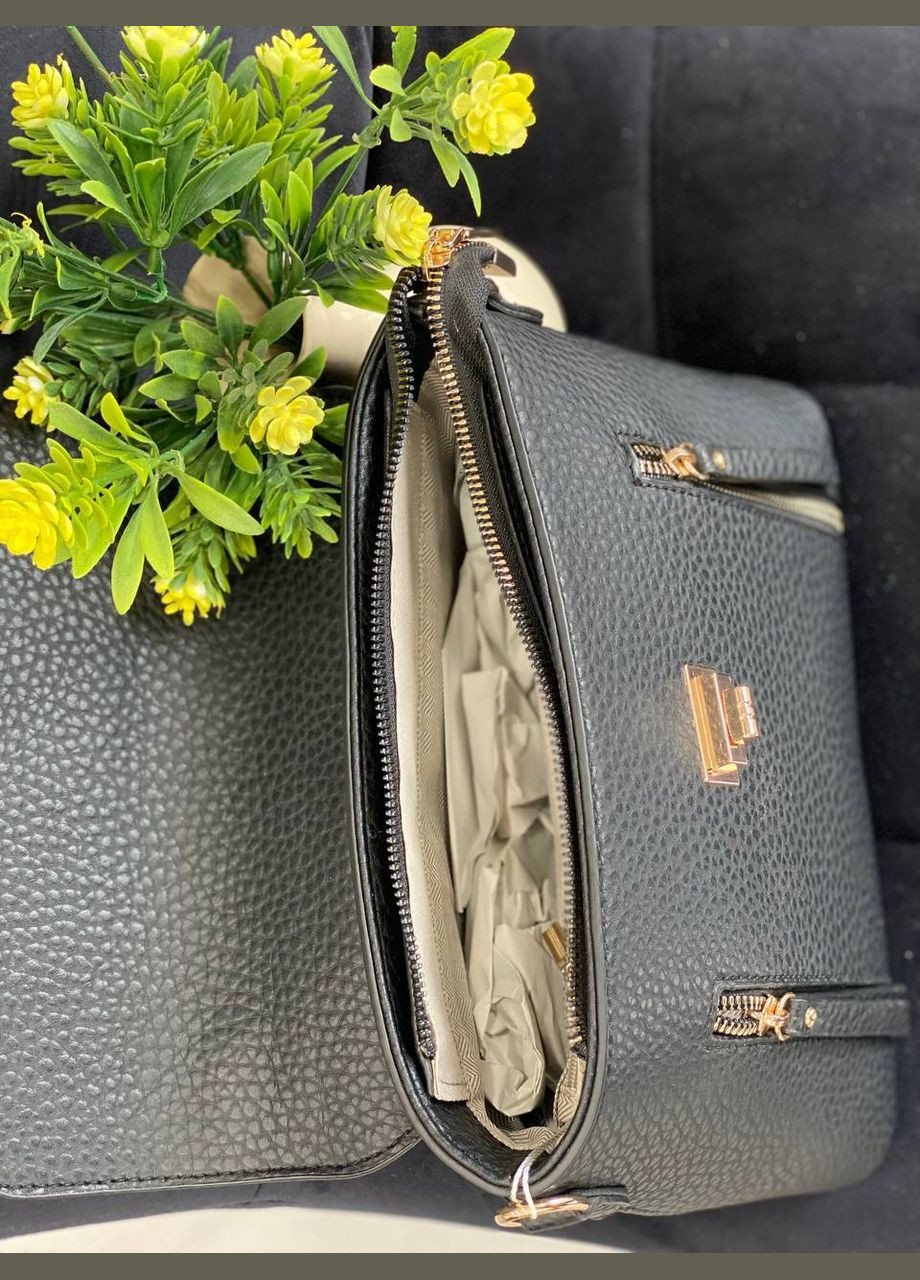 Жіноча сумка-портфель з пористої еко-шкіри чорного кольору 32066 No Brand (325407685)