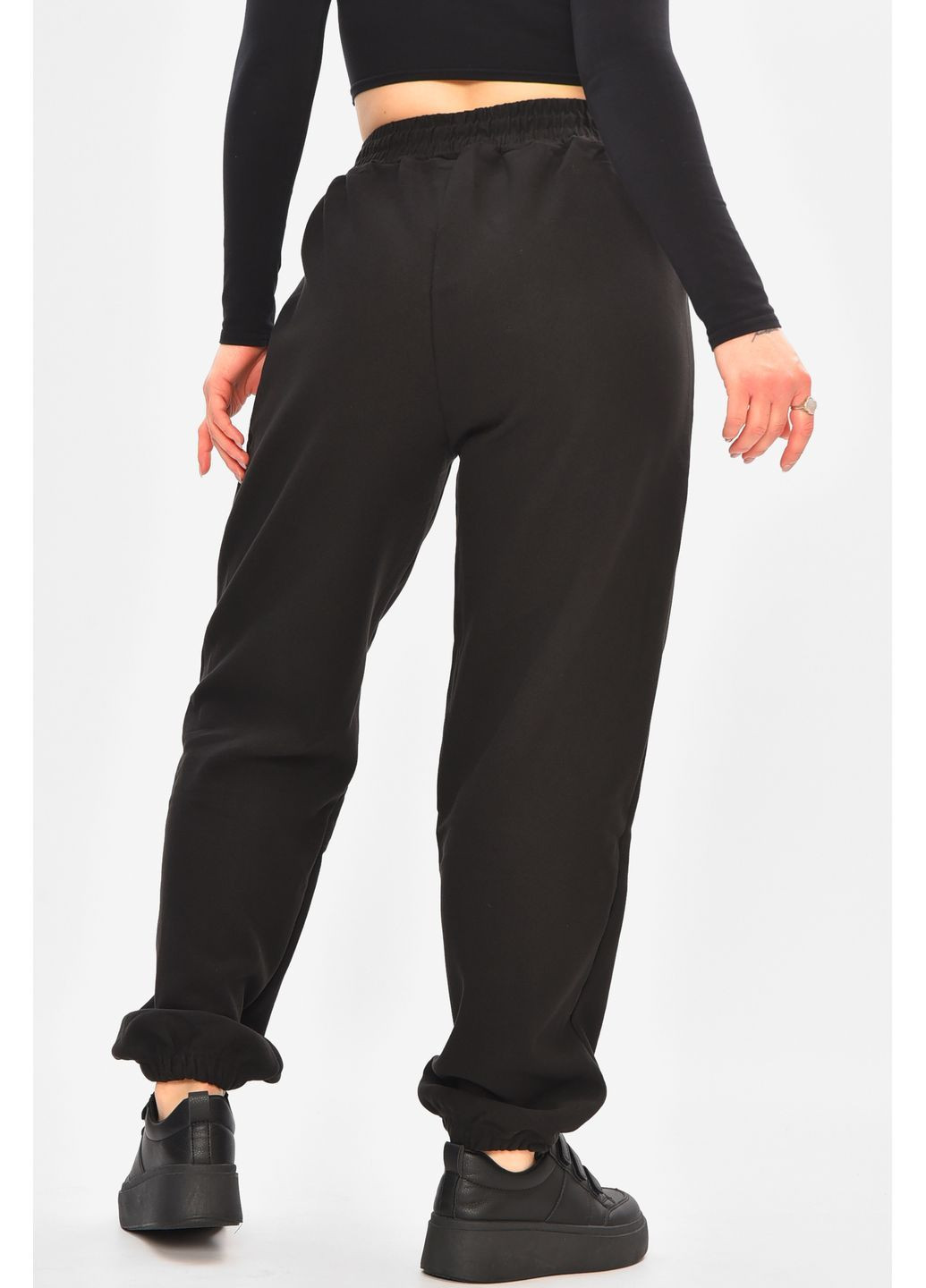 Спортивні штани жіночі на флісі чорного кольору Let's Shop (368726640)