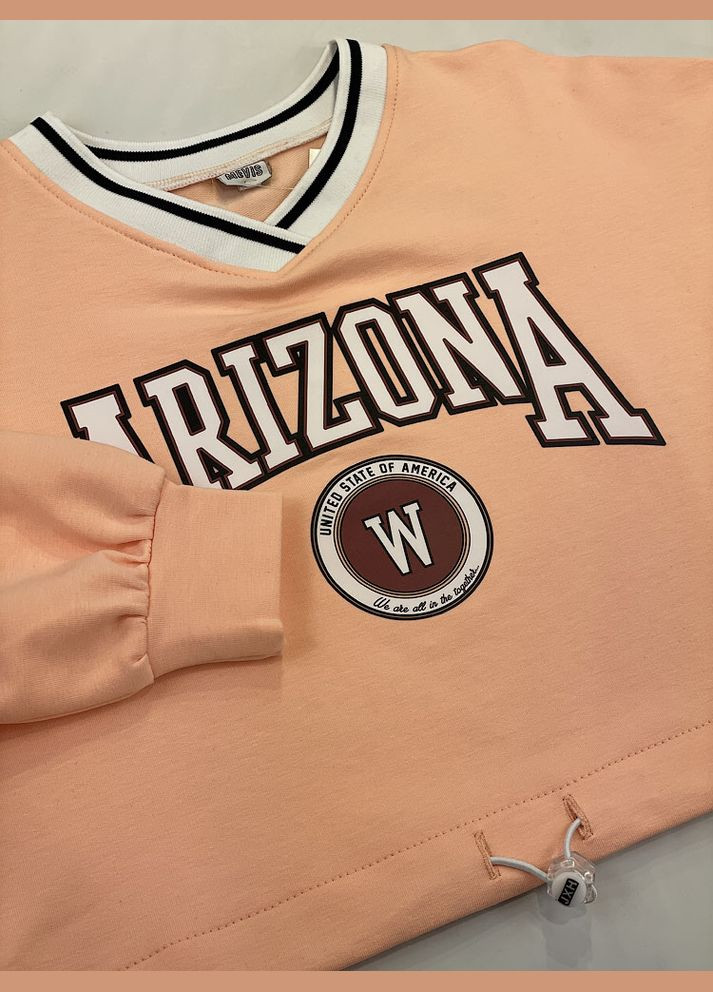 Персиковый демисезонный трикотажный костюм для девочки Mevis