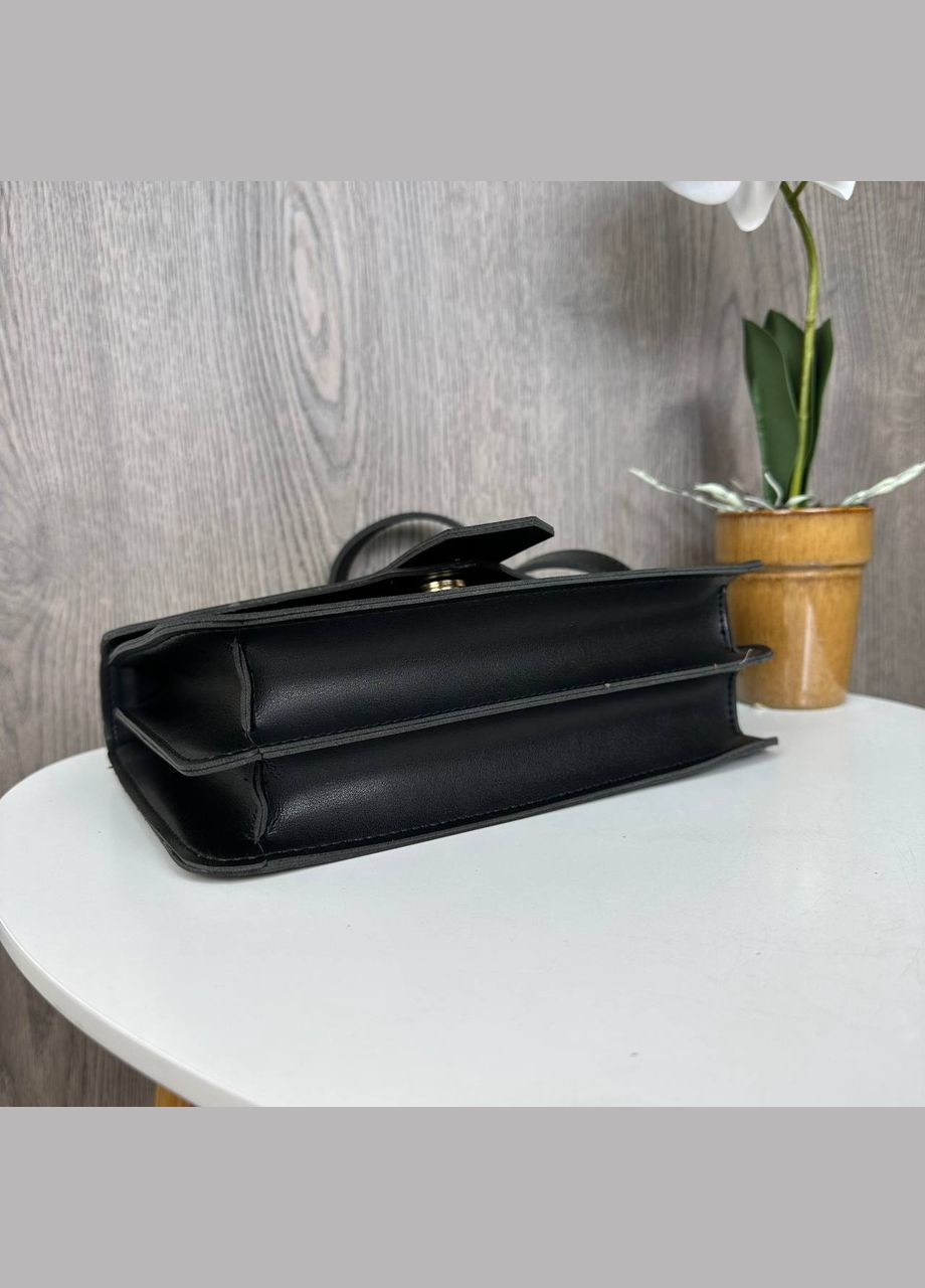 Маленька жіноча сумочка клатч міні сумка на ланцюжку чорна з золотим Eton (314762000)