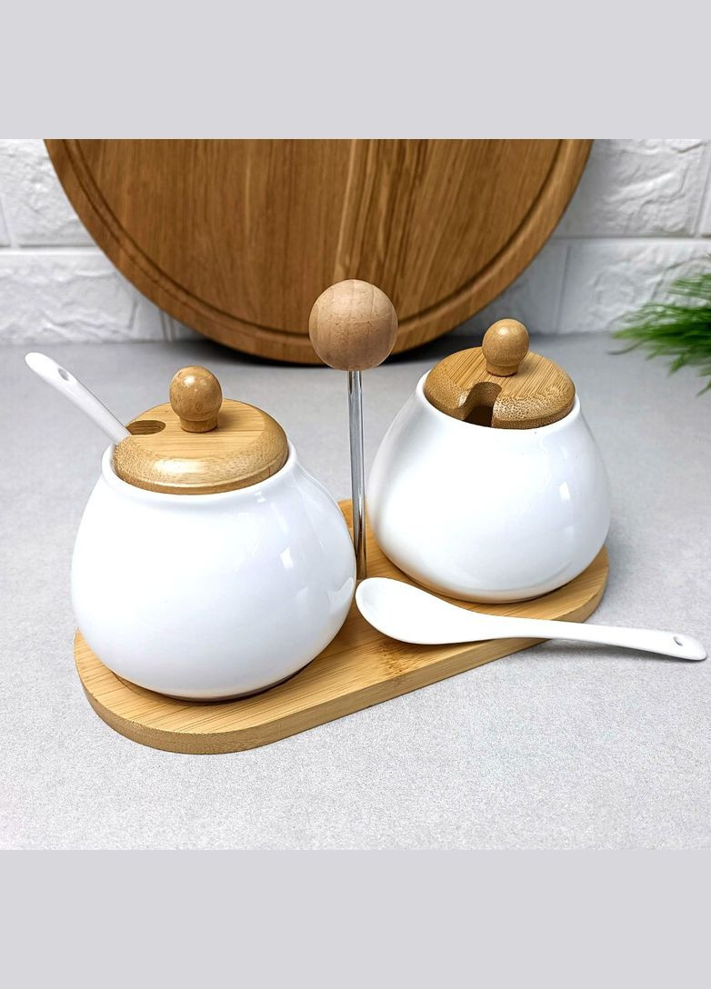 Набір білих банок з кришками на бамбуковій підставці 5 предметів Di Naturel Bona (303212576)