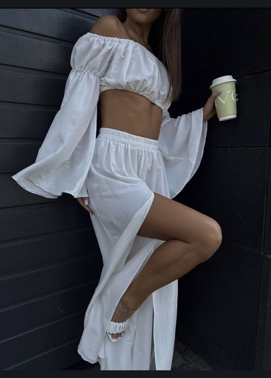 Вишуканий жіночий костюм з топом та штанами Adelante (339606110)