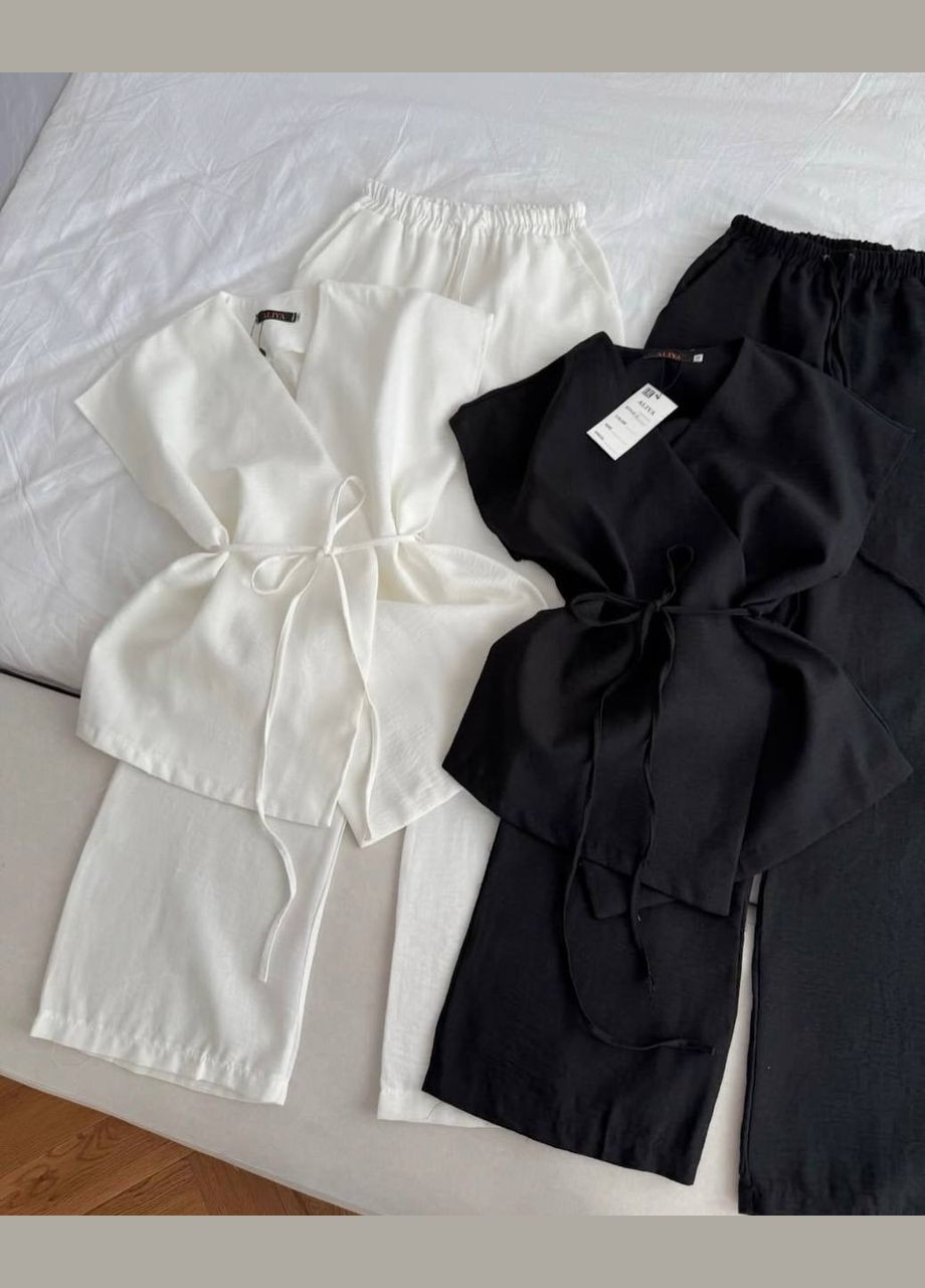 Жіночий брючний костюм без рукавів Adelante (334291879)