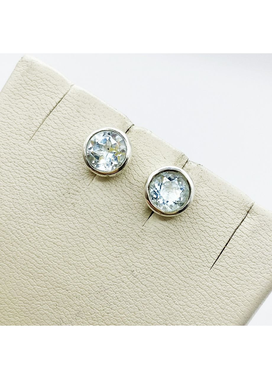 Сережки-гвоздики срібні з блакитним топазом 2 г No Brand (369737375)