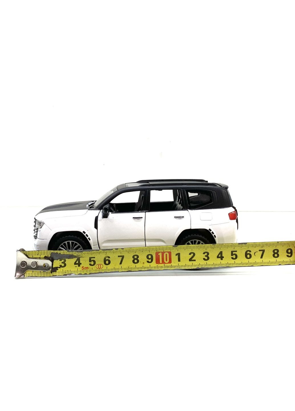 Машина Автосвіт Toyota Land Cruiser 300 інерційна масштаб 1:32 відчиняються двері капот багажник 15 см Біла (AP-2088) No Brand (302215727)
