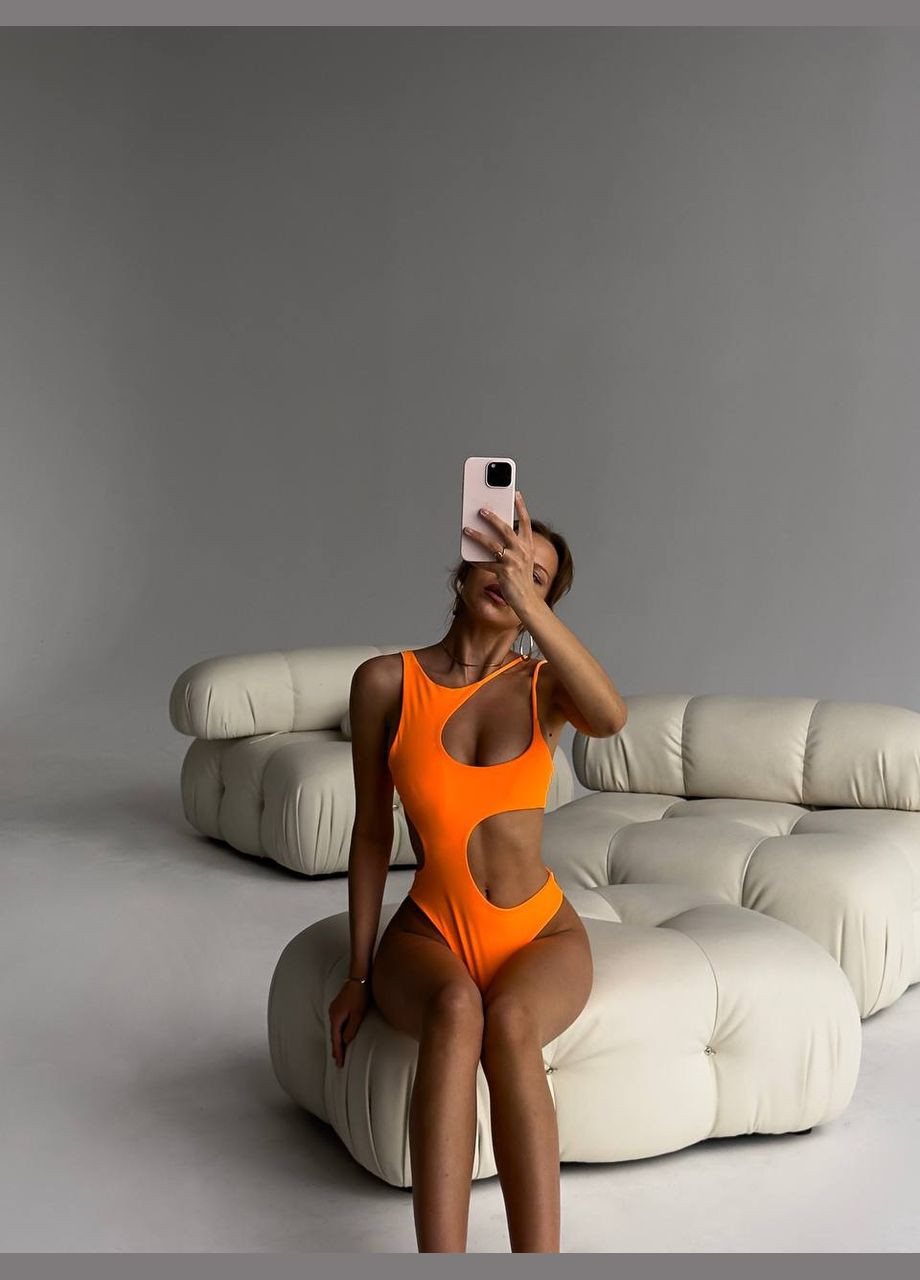 Оранжевый летний стильный купальник с ассиметричными вырезами раздельный, слитный Vakko