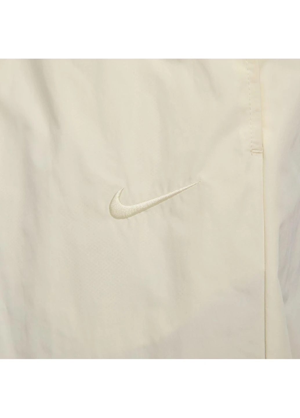 Бежевые брюки Nike