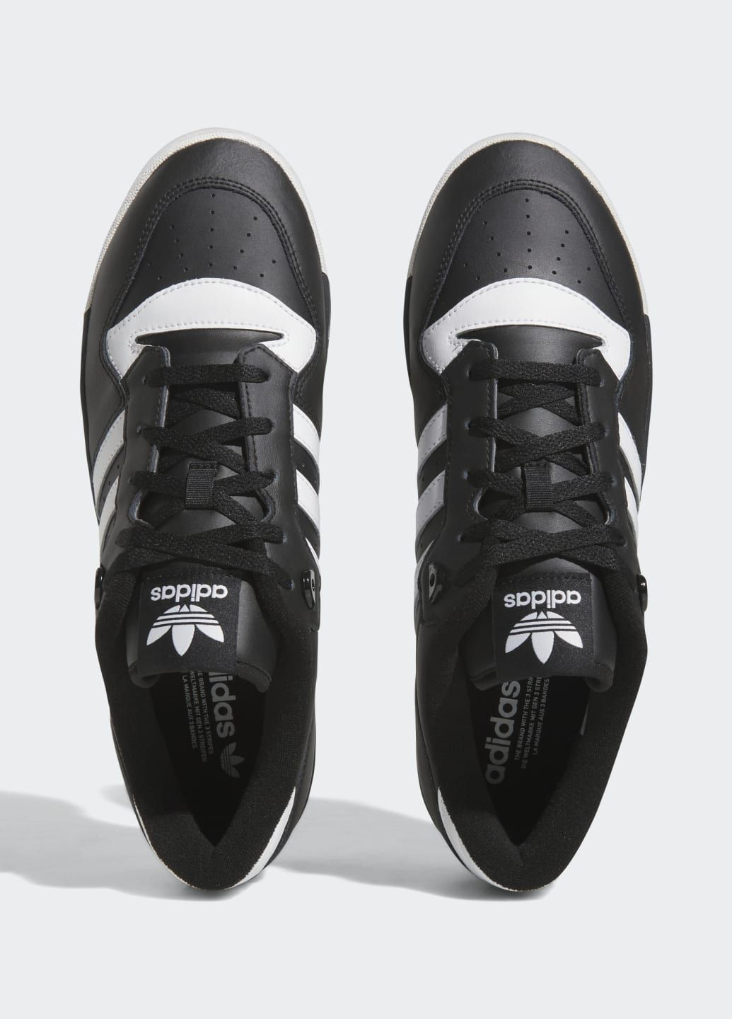 Чорні всесезон кросівки rivalry low adidas