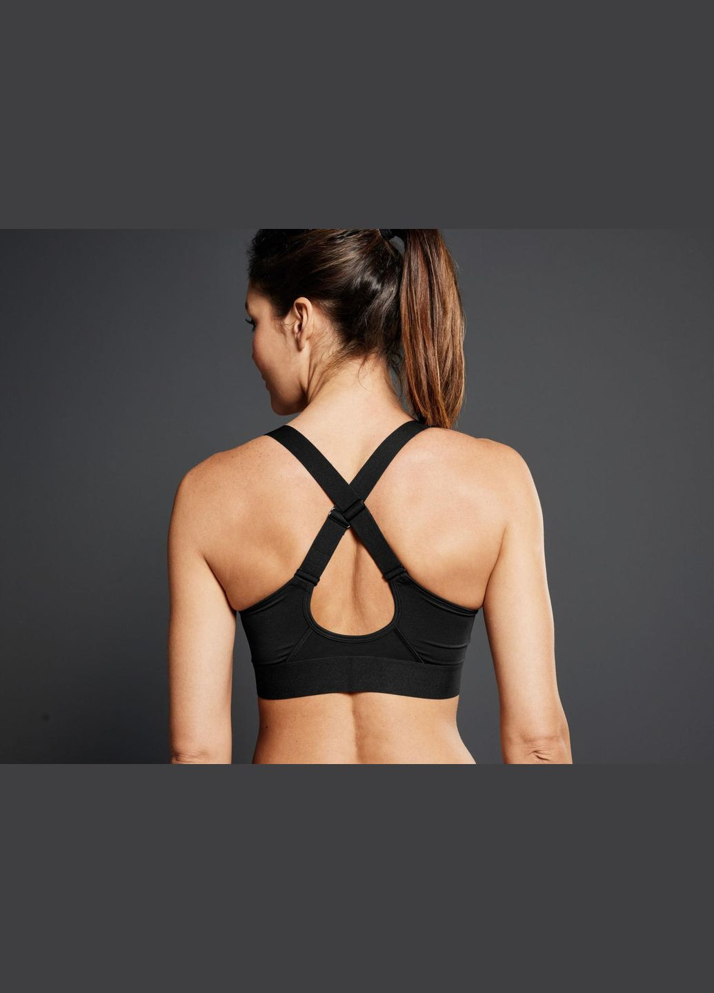 Спортивний топ з ущільненими чашками для жінки LYCRA® 457544 чорний Crivit (325609074)