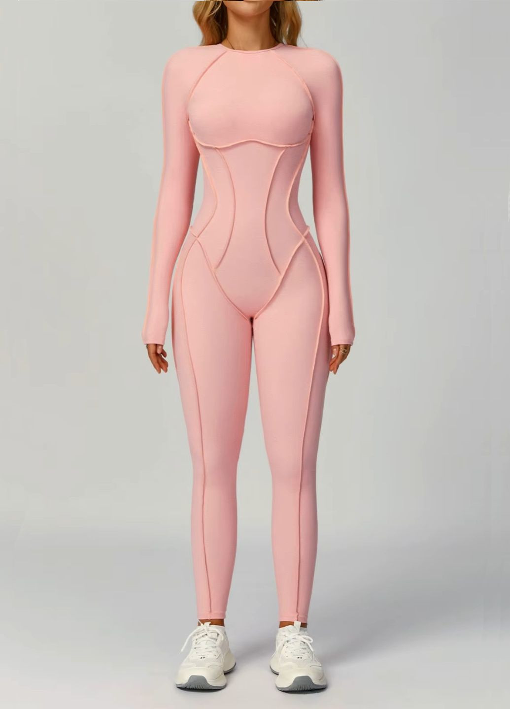 Женский спортивный сплошной комбинезон, декорированный швами с длинным рукавом и открытой спинкой. Strunka комбинезон-брюки однотонный розовый спортивный