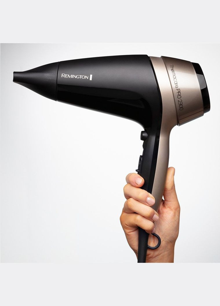 Фен Thermacare Pro, 2100Вт, 3 режими, дифузор,турмалинова іоніз-я, хол. обдув, чорно-коричневий Remington (315003809)