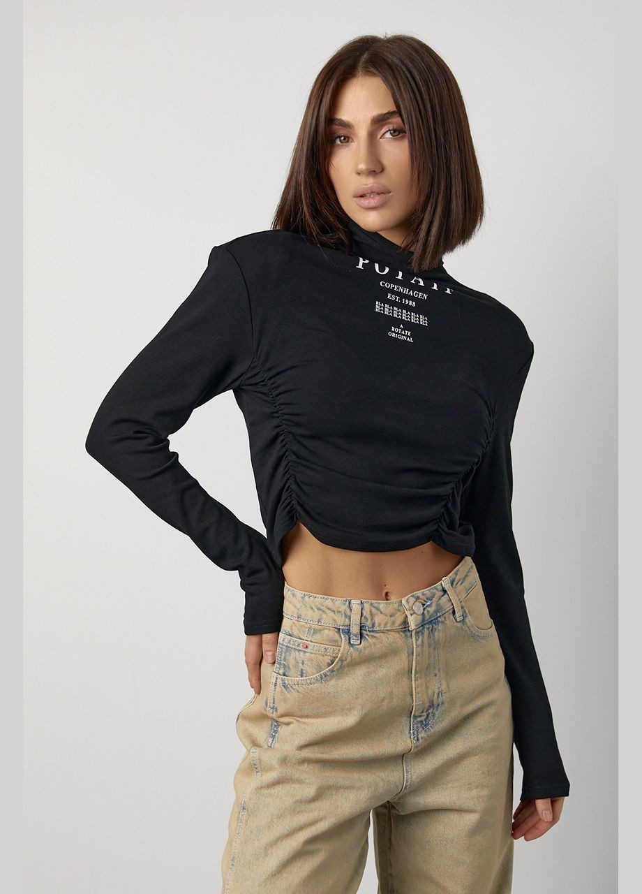 Трикотажний жіночий гольф з драпіруванням та написами - коричневий Lurex (317233741)