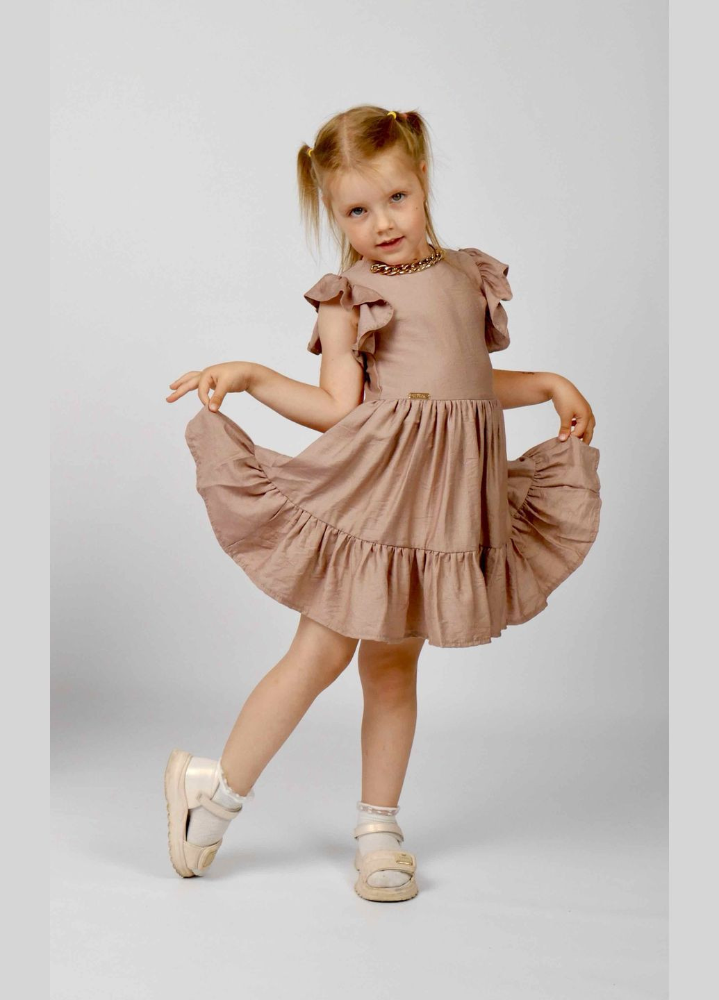 Темно-бежева сукня для дівчинки Kodi (340907751)
