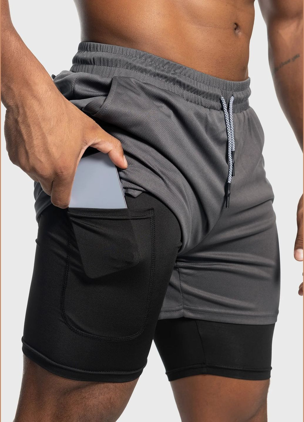 Мужские спортивные шорты с тайтсами карманом для смартфона и петелькой для полотенца темно-серые No Brand (341721020)