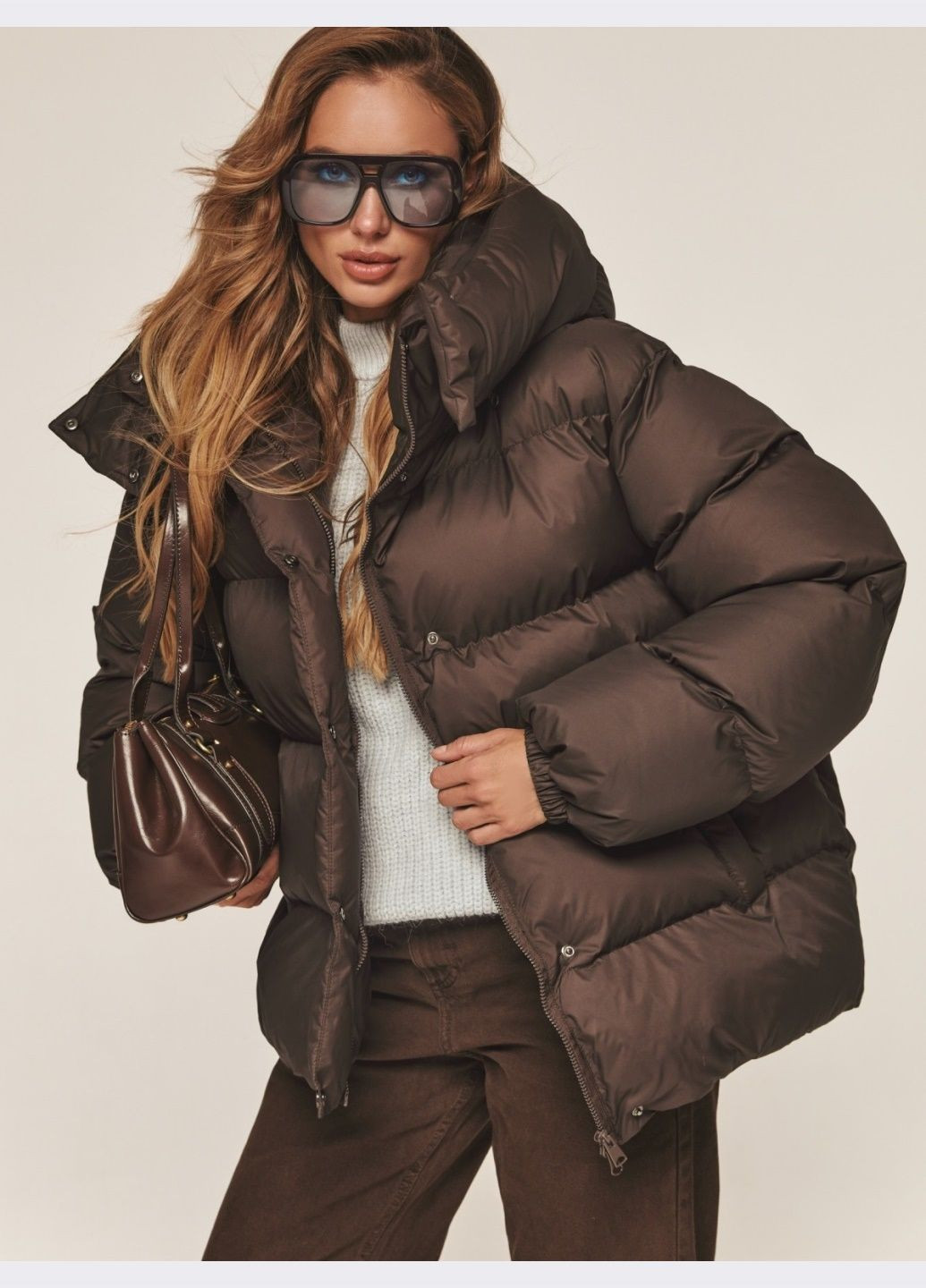 Коричнева зимня пуфер зі знімним капюшоном коричневий Dressa