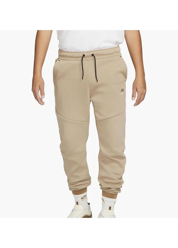 Оливковые демисезонные брюки Nike