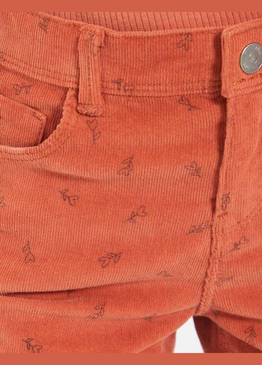 Светло-оранжевые брюки Kiabi