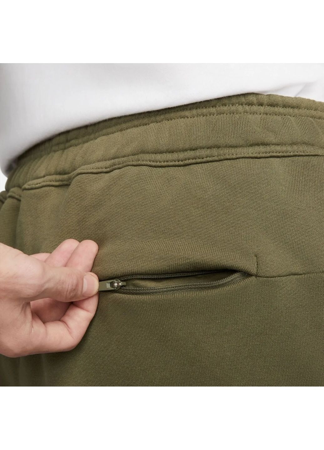 Оливковые демисезонные брюки Nike