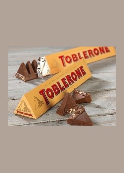 Шоколад молочний з медом та мигдальною нугою 100г. Toblerone (349810862)