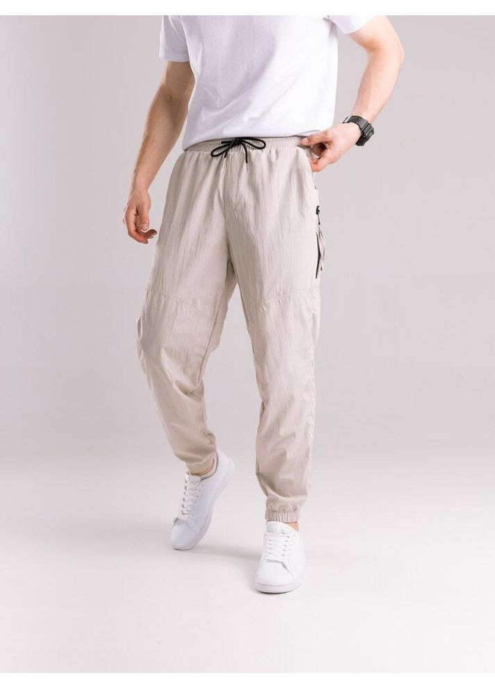 Чоловічі демісезонні спортивні штани бежеві No Brand (353390418)