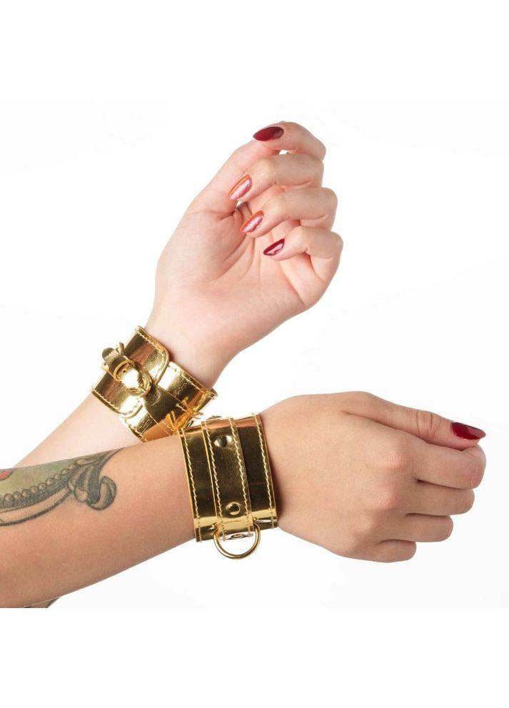 Наручники для БДСМ (без зчіпки) DS Fetish лаковане золото No Brand (356512048)