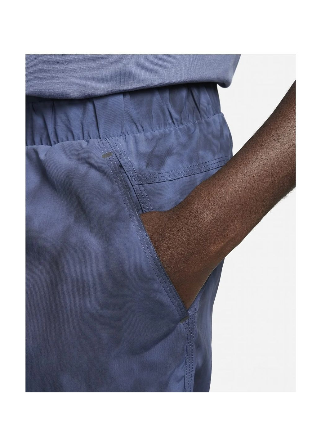 Синие демисезонные брюки Nike