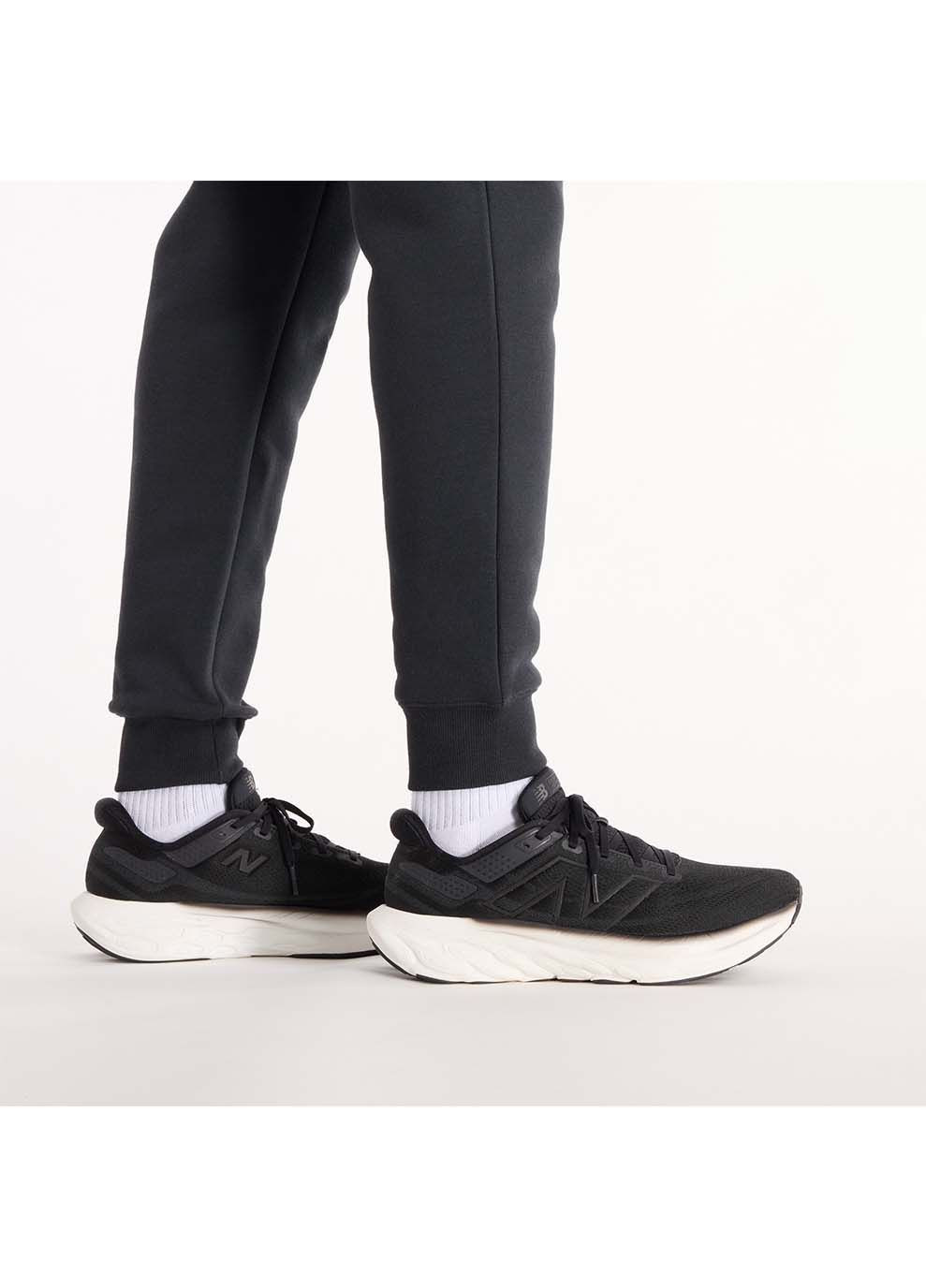 Черные демисезонные брюки New Balance