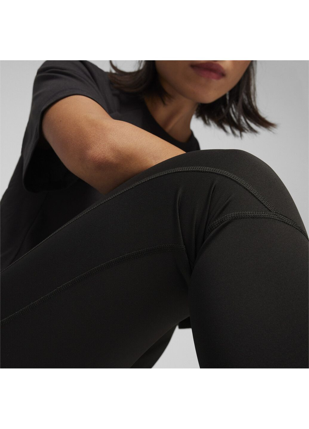 Черные демисезонные леггинсы evostripe women's leggings Puma