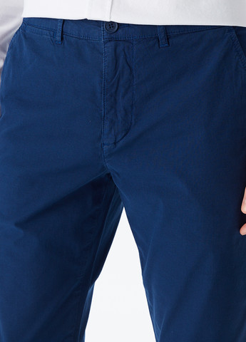 Синие кэжуал демисезонные чиносы брюки Lacoste