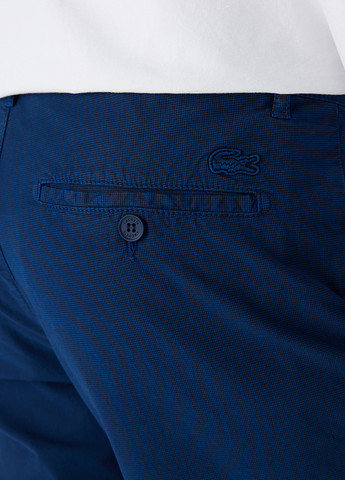 Синие кэжуал демисезонные чиносы брюки Lacoste