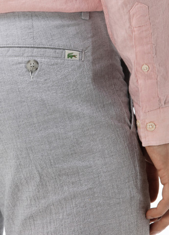 Светло-серые кэжуал демисезонные зауженные брюки Lacoste
