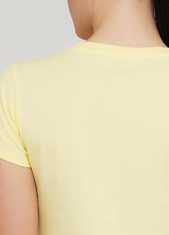 Жовта літня футболка New Balance Ess Stacked Logo
