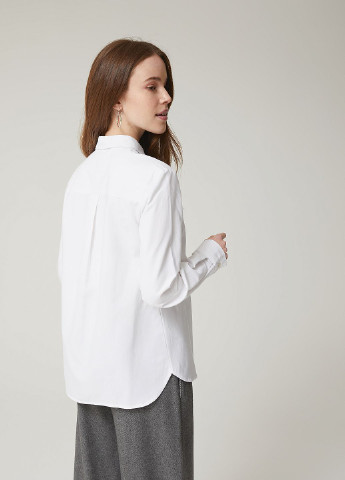 Белая демисезонная блузка SELA