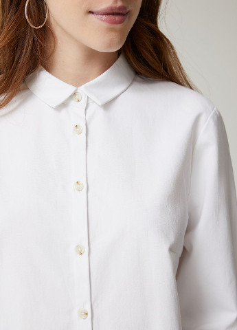 Белая демисезонная блузка SELA