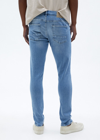 Голубые летние зауженные джинсы KOTON