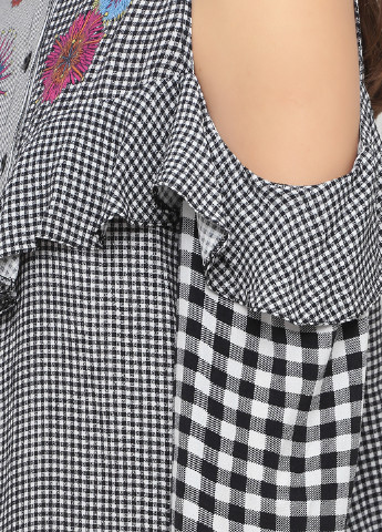 Черно-белая демисезонная блуза Desigual