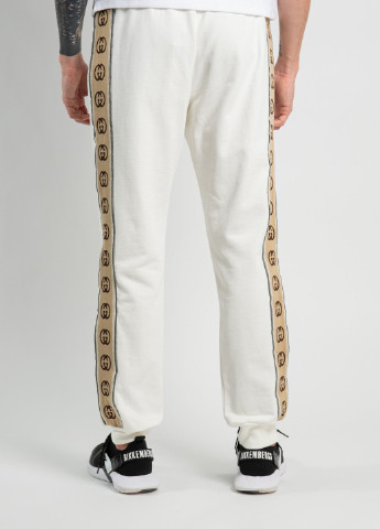 Сірий спортивний штани з брендованими лампасами Gucci (251250178)