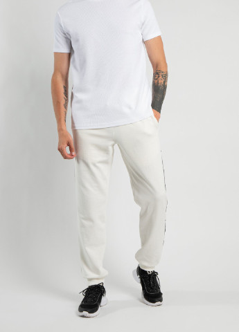 Белые демисезонные брюки Gucci