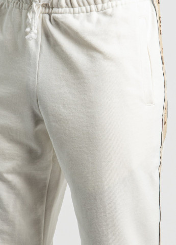 Белые демисезонные брюки Gucci