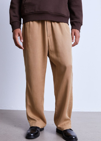 Бежевые спортивные демисезонные брюки H&M