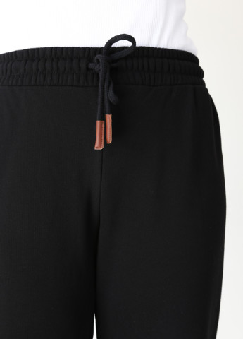Спортивні штани жіночі чорні широкі Bebe прямая (254091021)