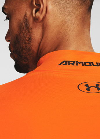 Оранжевый демисезонный спортивный лонгслив Under Armour с абстрактным узором